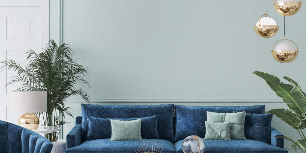 Home interior mockup with blue sofa, marble table and tiffany bl